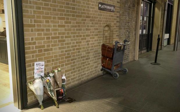 Potterheads Are Laying Flowers At Platform 9 3/4 In Honour Of Alan Rickman