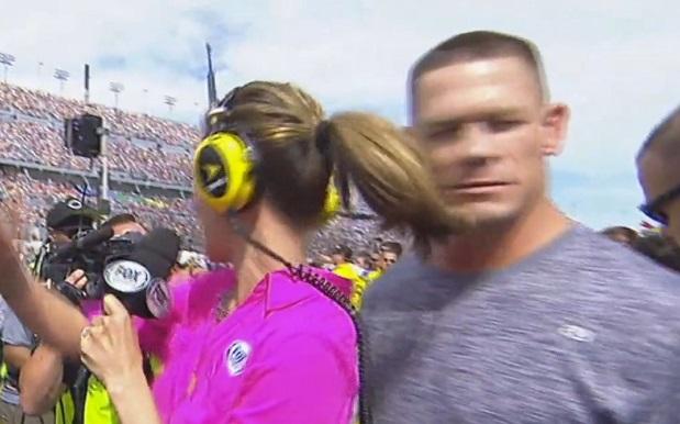 WATCH: John Cena Takes Reporter’s Ponytail To The Face With Sad Dignity