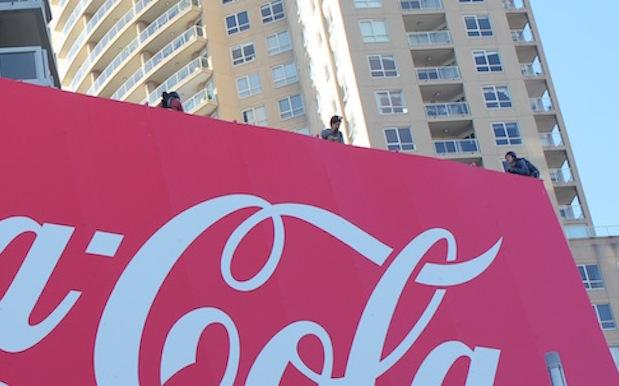 Cops Slap Seven Protesters With Charges Over Kings X Coke Sign Stunt