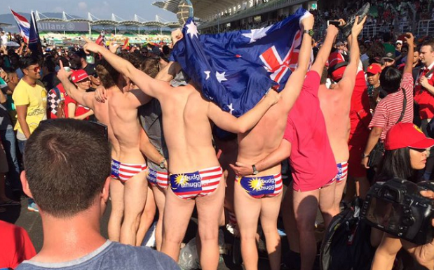 9 Aussies Nabbed In Malaysia For Rocking “Disrespectful” Flag-Themed Togs