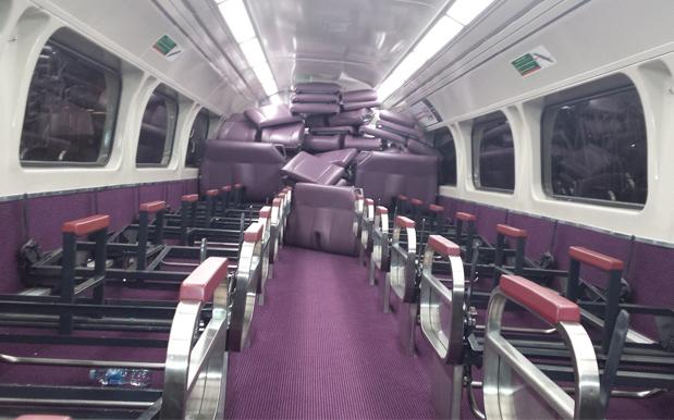 Vandals Ripped Up The Seats On A NSW Train Carriage & Stacked Them V Neatly