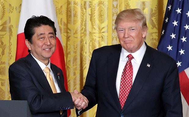 WATCH: Trump Lays A Brutally Long Handshake On The Japanese PM