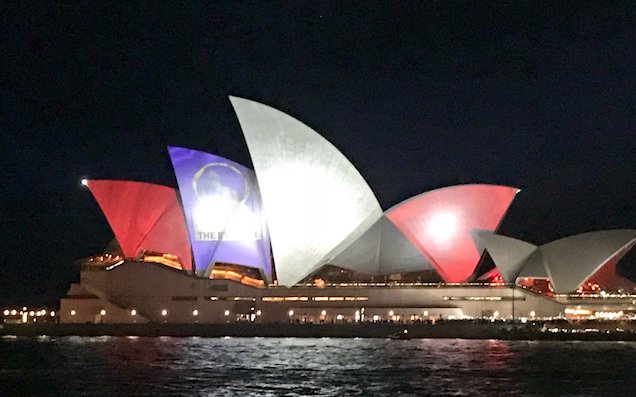 Protestors Used Big Ol’ Spotlights To Obscure The Projections On The Opera House