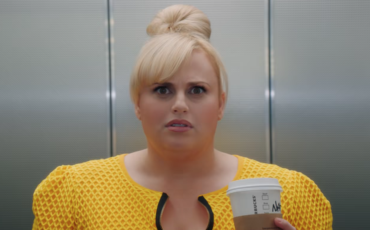 Rebel Wilson Cursed To Pash A Hemsworth In The ‘Isn’t It Romantic’ Trailer