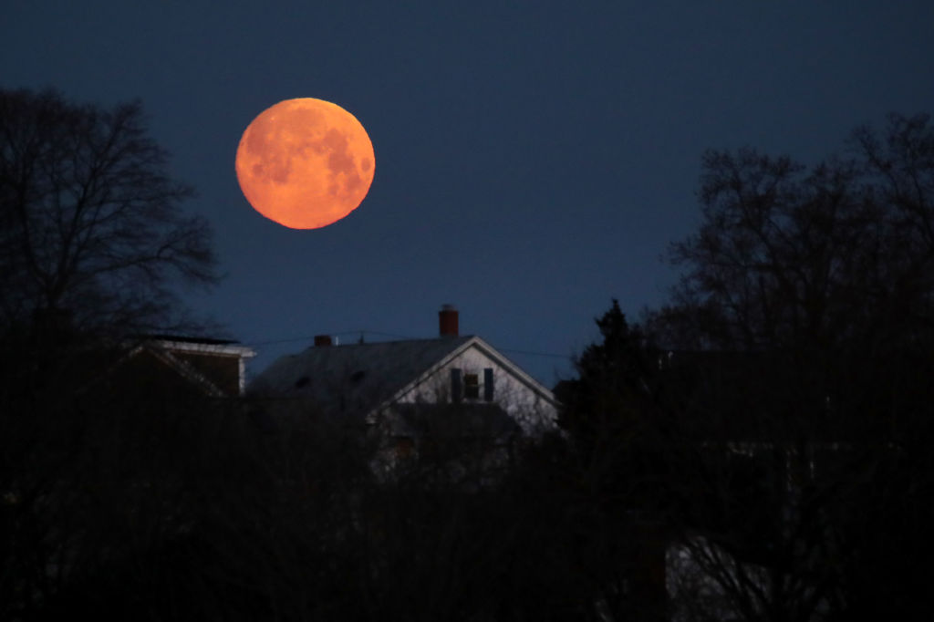 What The Energy Of Tonight’s Super Worm Equinox Moon Means, If You’re Into That