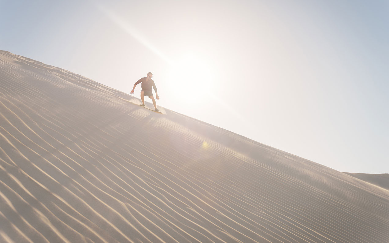 Where To Go In Queensland If You Want To Give Sand Boarding A Red Hot Go