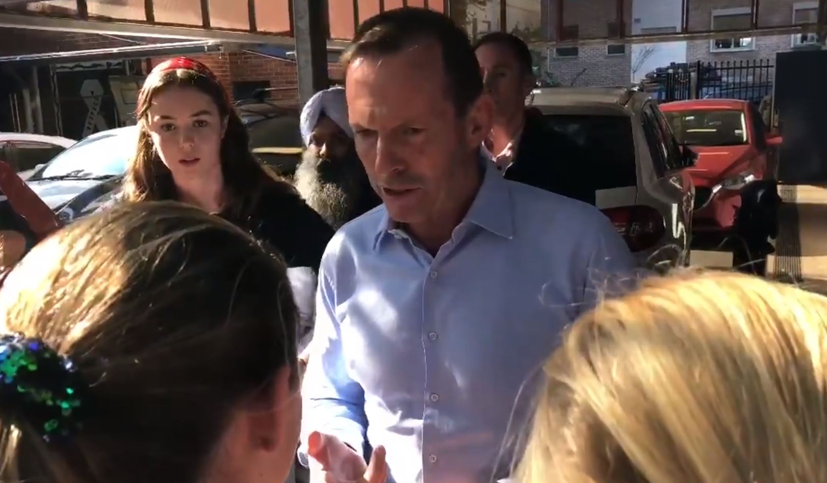 Here’s Tony Abbott Copping An Election Day Grilling From Kids Over Climate Change