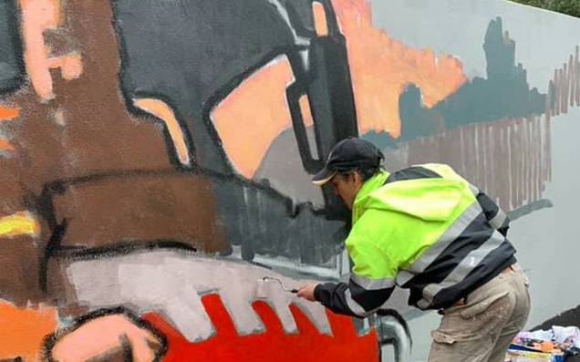 The Artist Behind Melbourne’s “Tell The PM To Get Fucked” Mural Got Arrested