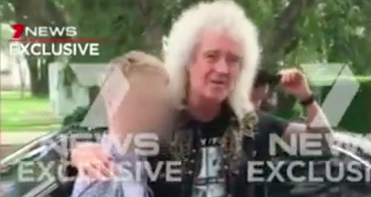 Queen’s Brian May Slams Channel 7 After Run-In With “Rudest” Cameraman At Brisbane Airport