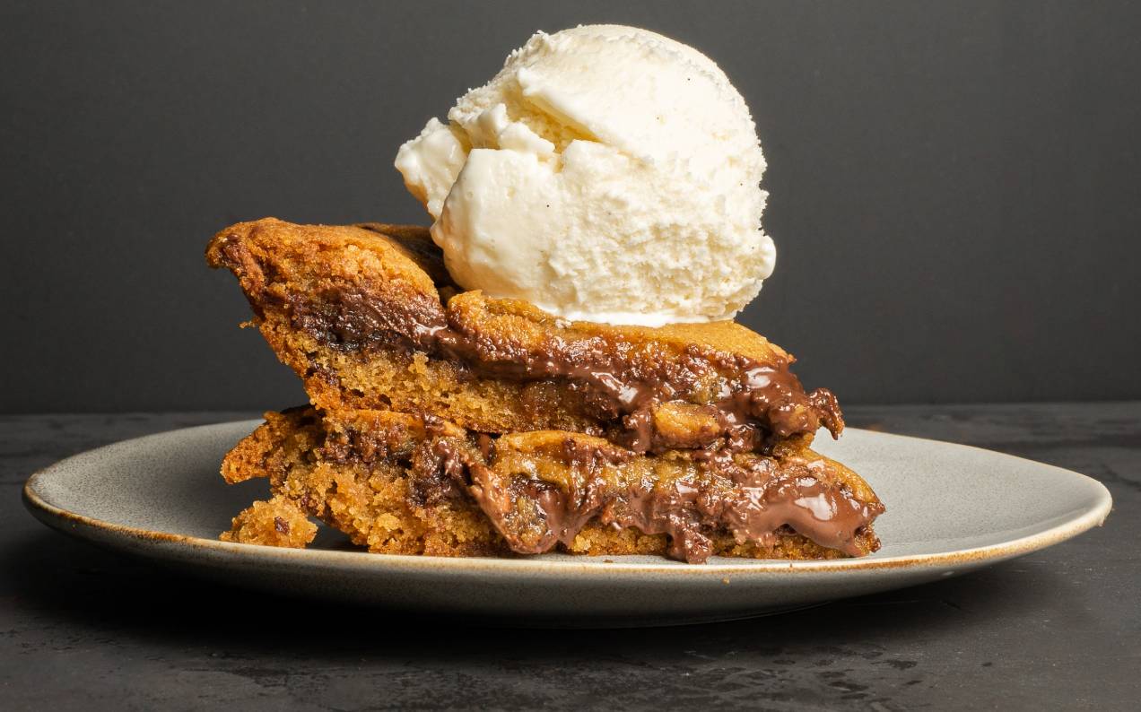Messina Is Doing A Gooey Choc-Hazelnut Twist On Its OG Cookie Pie And Lord, Have Mercy
