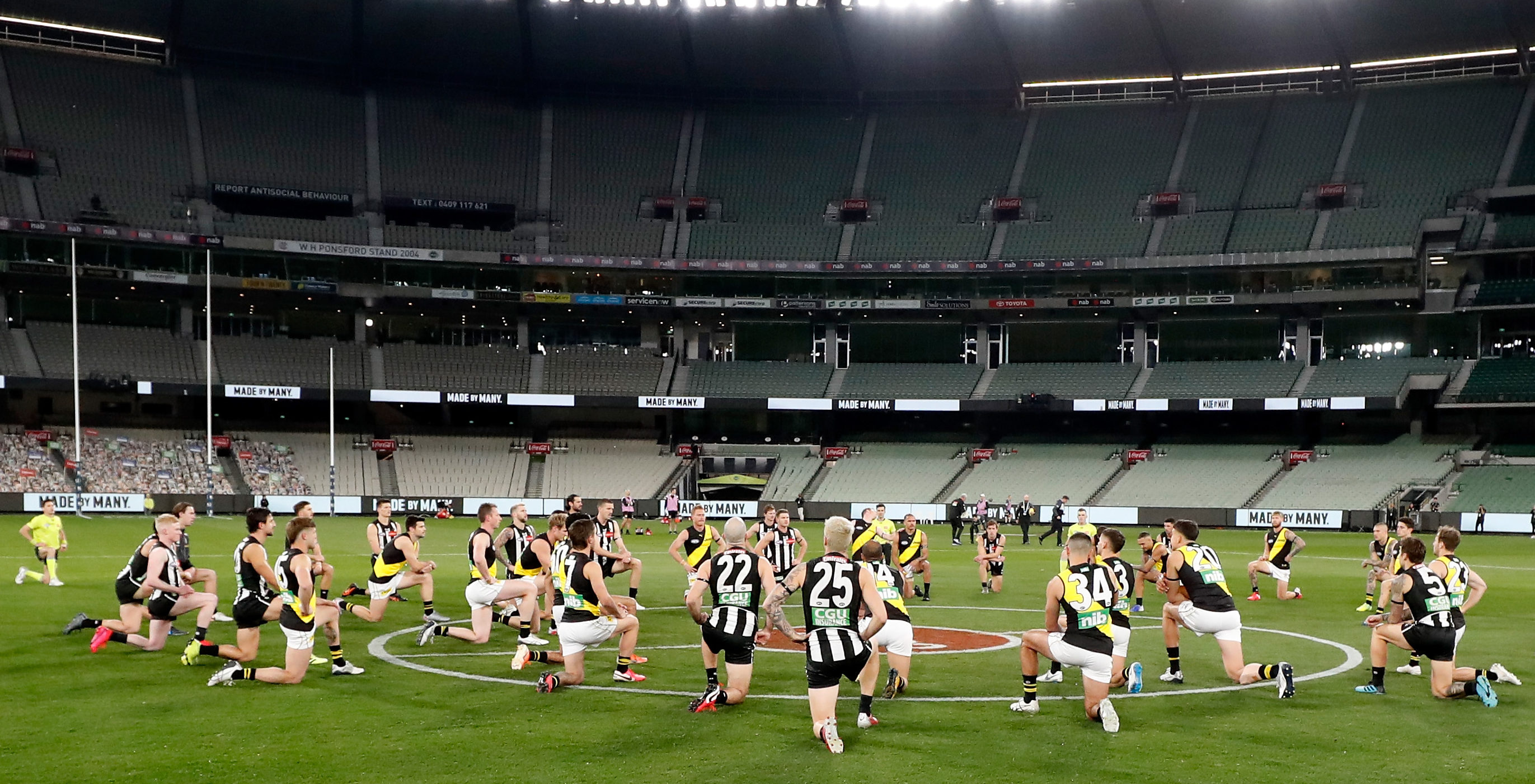 AFL Players Just Took A Knee Before Tonight’s Game In A Powerful Statement Against Racism