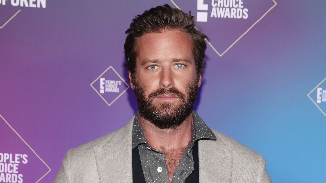 Armie Hammer Spotted In The Caymans With Mystery Woman Who Should Blink Twice If She Needs Help