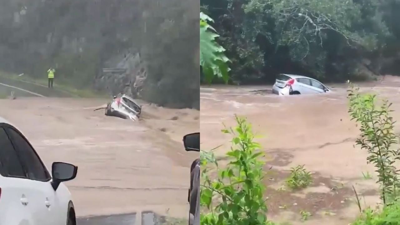 This Car Being ‘Consumed’ By QLD Floodwaters Is A Grim Reminder Not To Fuck With Mother Nature